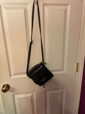 Stylish Black Crossbody Bag with Gold Hardware